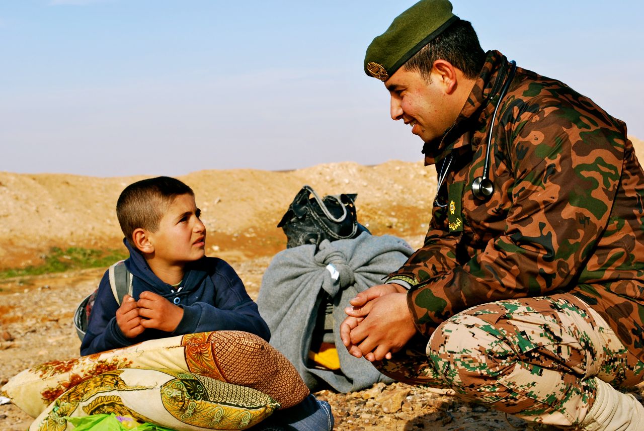 The boy refused to speak to CNN, but opened up to this Jordanian border security force doctor.