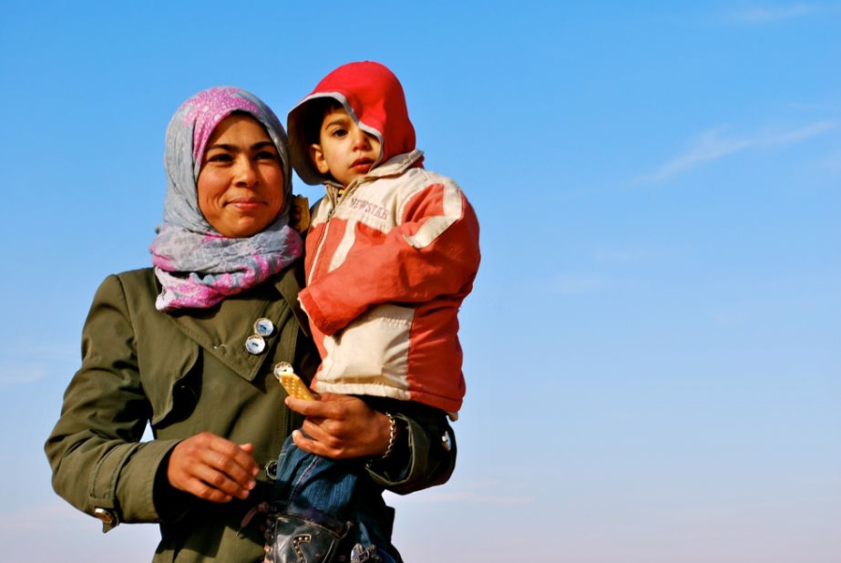 The majority of the refugees walking across the border are women with children. Many of the men have either stayed behind to fight or have been killed during the three-year civil war in Syria.