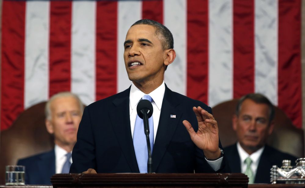 President Barack Obama delivers the State of Union address before a joint session of Congress in the House chamber on Tuesday, January 28, 2014, in Washington, as Vice President Joe Biden, left, and House Speaker John Boehner of Ohio listen.
