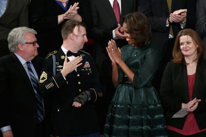 Obama wore <a href="index.php?page=&url=http%3A%2F%2Fwww.huffingtonpost.com%2F2014%2F01%2F28%2Fmichelle-obama-state-of-the-union-dress-2014_n_4676593.html" target="_blank" target="_blank">this forest green Azzedine Alaia ensemble</a> -- which included a full-skirted dress, an oversized belt and a cropped jacket -- for the State of the Union address on January 28, 2014.