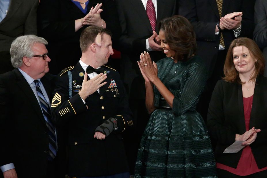 Obama wore <a href="http://www.huffingtonpost.com/2014/01/28/michelle-obama-state-of-the-union-dress-2014_n_4676593.html" target="_blank" target="_blank">this forest green Azzedine Alaia ensemble</a> -- which included a full-skirted dress, an oversized belt and a cropped jacket -- for the State of the Union address on January 28, 2014.