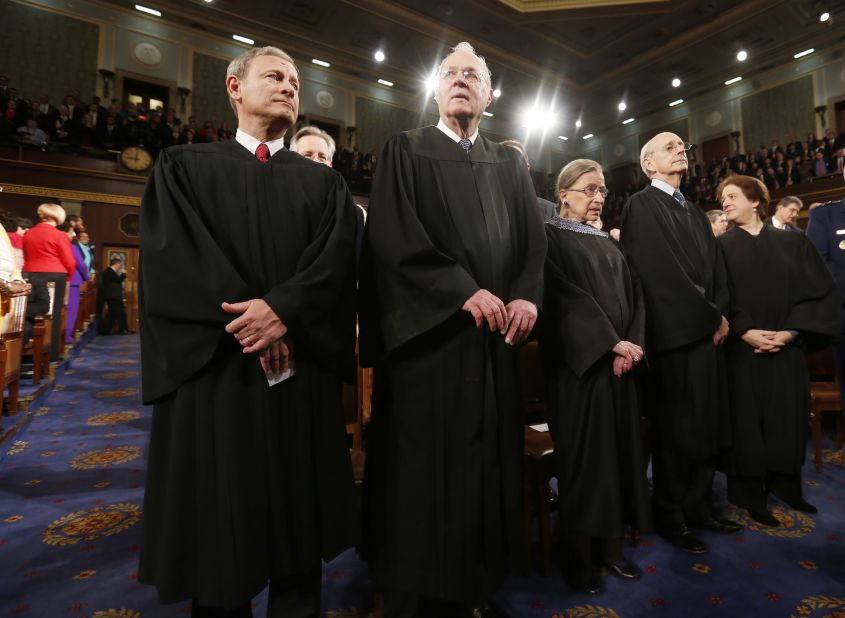 Members of the U.S. Supreme Court (from left): Chief Justice John Roberts, and Justices Anthony Kennedy, Ruth Bader Ginsburg, Stephen Breyer and Elena Kagan prior to the president's speech.