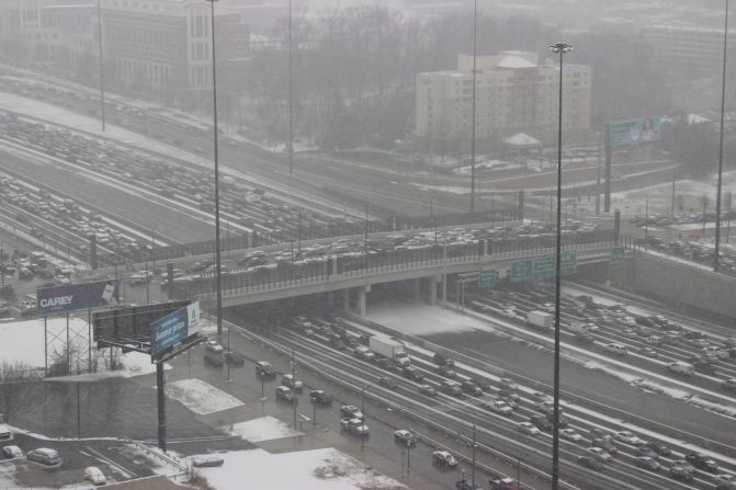 A rare snowstorm left thousands of motorists trapped on Atlanta interstates overnight. "Thank God I walk to work everyday," said <a href="index.php?page=&url=http%3A%2F%2Fireport.cnn.com%2Fdocs%2FDOC-1079053">Doug Simonton</a>, who snapped this photo Tuesday afternoon.