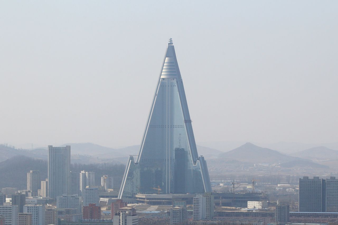 <em>Ryugyong Hotel</em><br /><br />North Korea's tallest structure rises menacingly 330 meters over Pyongyang, and has been in construction for over two decades. Works stopped completely when cash flow was severed after the collapse of Soviet Union in 1992, but resumed in 2008. The pyramidal building, nicknamed "The Hotel of Doom", is set to be finally finished, or partially open in 2014.