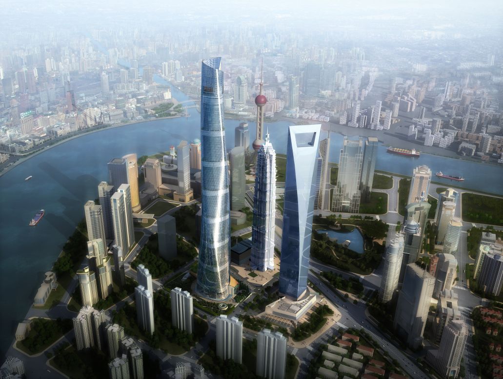 <em>Shanghai Tower </em><br /><br />Designed by<a href="http://www.gensler.com/" target="_blank" target="_blank"> Gensler</a>, the soaring tower, pictured on the left, has rounded corners allowing it to resist typhoon-force winds which often batter Shanghai. Its curved façade and spiraling form are also intended to symbolize the dynamic emergence of modern China. The 632-meter-high structure is currently being constructed in the core of Shanghai's Lujiazui commercial district, planned for completion later this year.