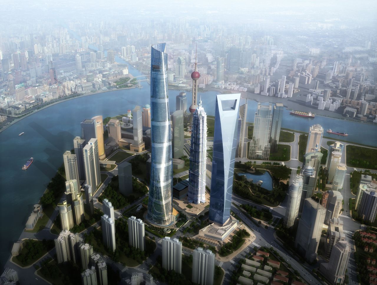 <em>Shanghai Tower </em><br /><br />Designed by<a href="http://www.gensler.com/" target="_blank" target="_blank"> Gensler</a>, the soaring tower, pictured on the left, has rounded corners allowing it to resist typhoon-force winds which often batter Shanghai. Its curved façade and spiraling form are also intended to symbolize the dynamic emergence of modern China. The 632-meter-high structure is currently being constructed in the core of Shanghai's Lujiazui commercial district, planned for completion later this year.