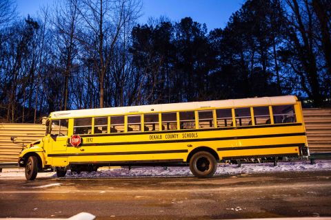 A DeKalb County school bus sits abandoned near Interstate 285 in Dunwoody on January 29.