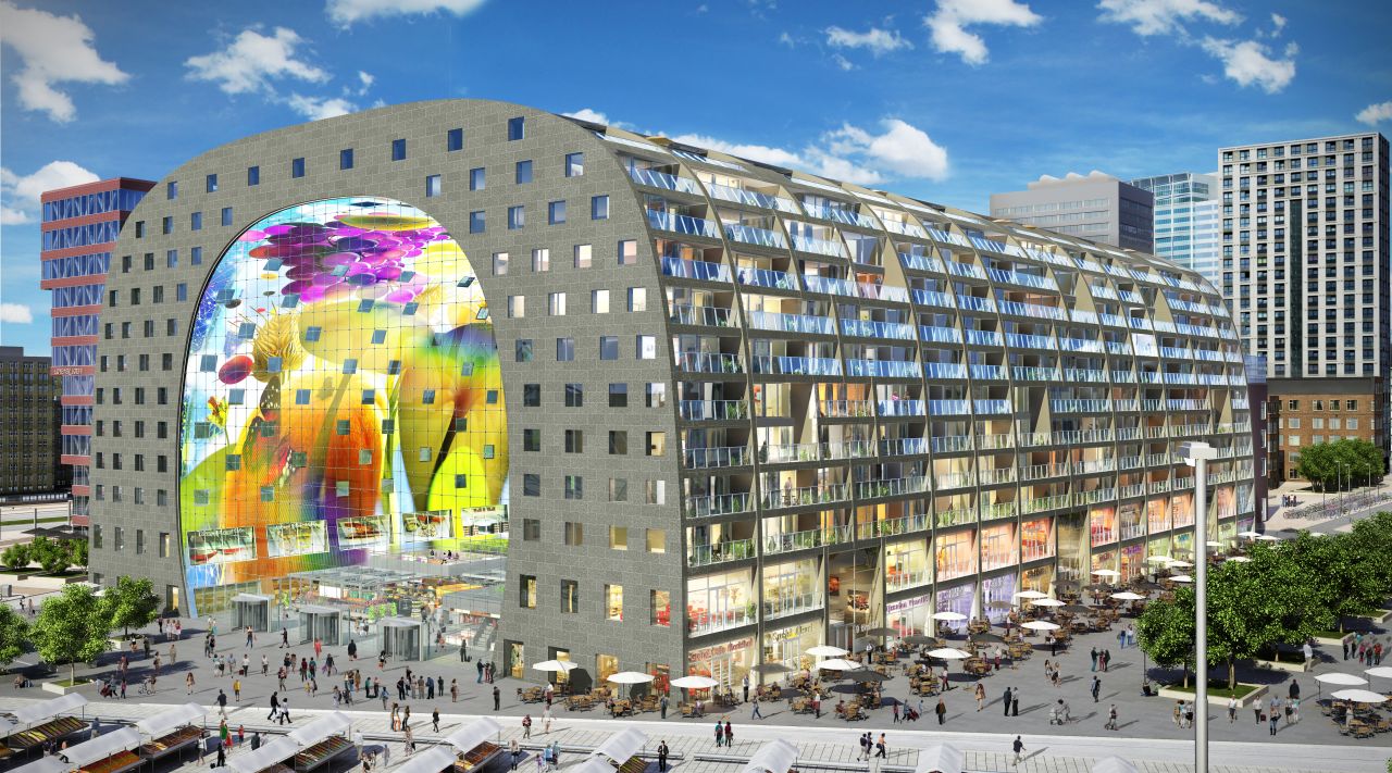 <em>Rotterdam Market Hall</em><br /><br />This tunnel-shaped structure in the Dutch port city of Rotterdam is designed as a hybrid between a bustling open-air market, and residential apartments. The project, by Dutch architects <a href="http://www.mvrdv.nl/en/" target="_blank" target="_blank">MVRDV</a>, is part of the regeneration plan of the city center, which was damaged badly in World War II bombing raids.