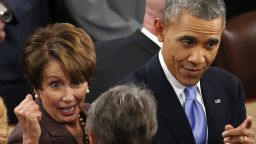 President Barack Obama, accompanied by House Minority Leader Nancy Pelosi of Calif., leave after he gave his State of the Union address on Capitol Hill in Washington, Tuesday Jan. 28, 2014. (AP Photo/Charles Dharapak)