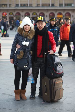 Married couple Wang Zhiyuan (R) and Wang Chenyang (L) from Baicheng, Jilin province, came to Beijing six years ago. Wang first studied in medical school and now works in a hospital's pharmacy in Chaoyang district. His wife sells massage machines.