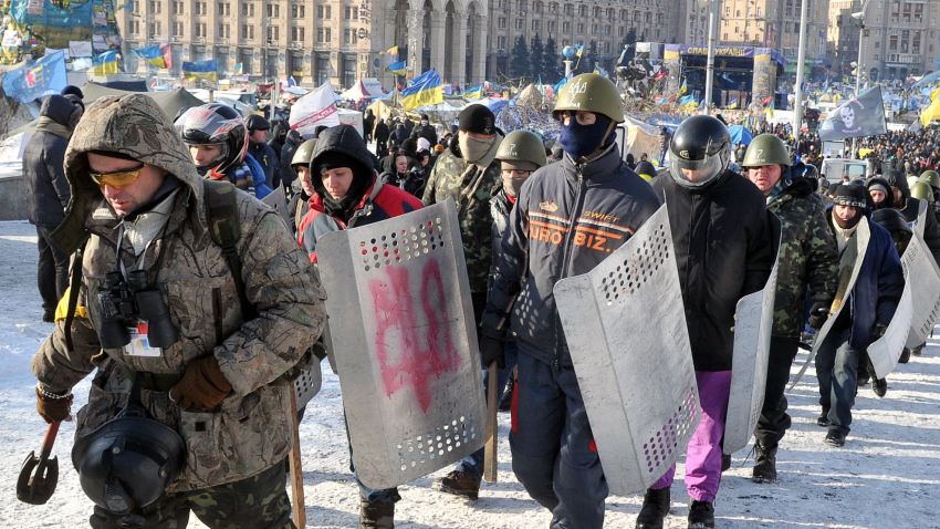 'Maidan' (name given by Ukrainian anti-government protesters to Independence square in Kiev, their main rally point) self-defence troops rally in Kiev on January 29, 2014, marking the 96th anniversary of a battle near the small city of Kruty.