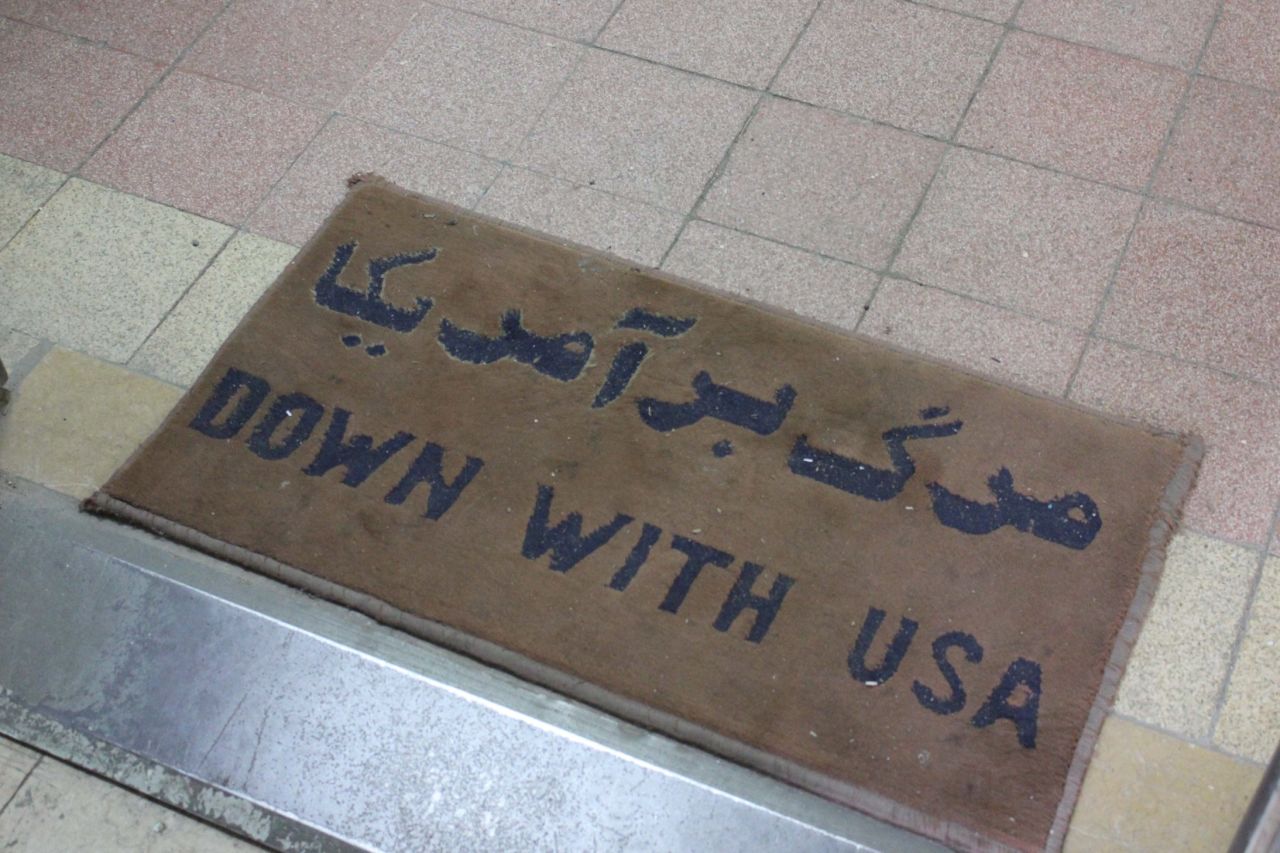 This mat, which lies at the entrance to the secure part of the embassy, is an example of the anti-American propaganda there today. In Farsi, the writing says "Death to America."