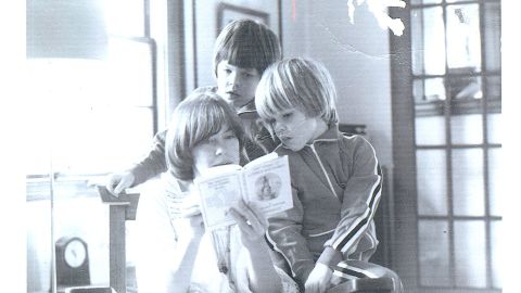Matt Damon, right, at 5, and Kyle Damon, 8, listen to their mother Nancy Carlsson-Paige reading Beatrix Potter in 1975.