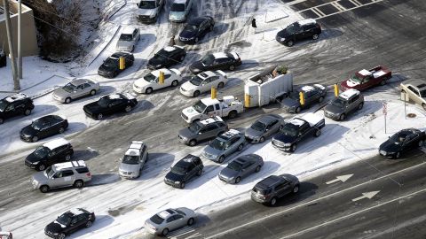 Abandoned cars are piled up on the median of icy Cobb Parkway in Atlanta.