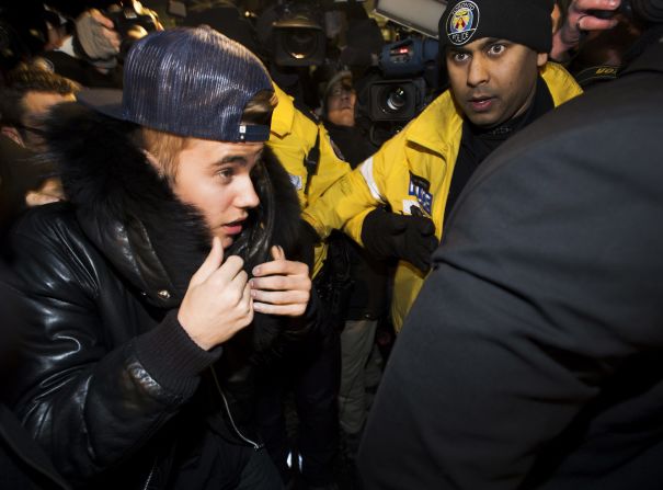 <a href="index.php?page=&url=http%3A%2F%2Fwww.cnn.com%2F2014%2F01%2F29%2Fshowbiz%2Fjustin-bieber-toronto-arrest%2Findex.html">Bieber turned himself in</a> at a Toronto police station on January 29, 2014, facing an assault charge stemming from an encounter with a limousine driver in December. But <a href="index.php?page=&url=http%3A%2F%2Fwww.cnn.com%2F2014%2F09%2F08%2Fshowbiz%2Fjustin-bieber-charge-dropped%2Findex.html">the charge was dropped</a> in September after prosecutors decided there was "no reasonable prospect" of convicting Bieber of striking his limo driver on the back of his head, said Brendan Crawley, a spokesman for the Ontario attorney general's office.