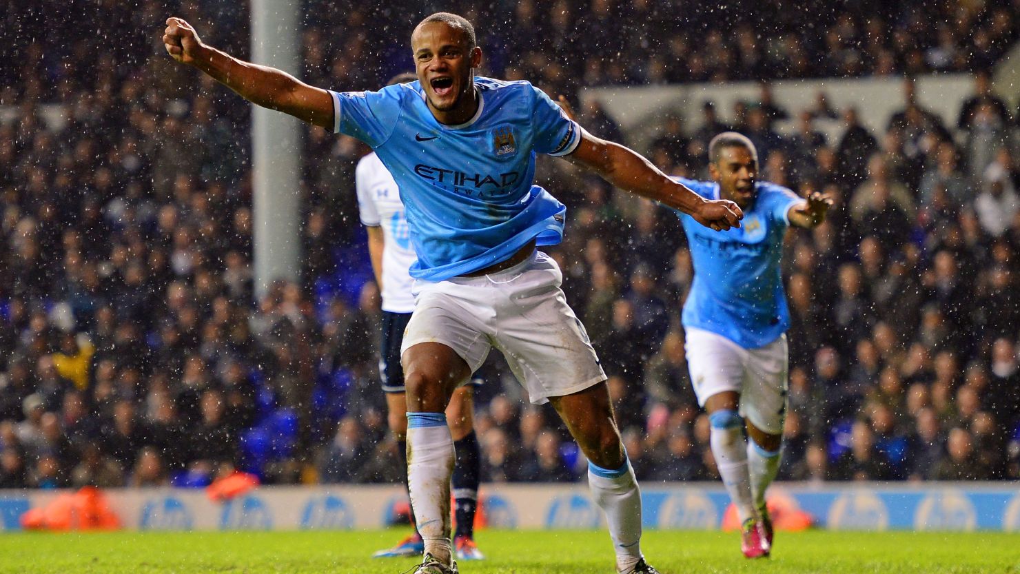 Vincent Kompany celebrates a goal and, more importantly, taking his team back to the top of the English Premier League.