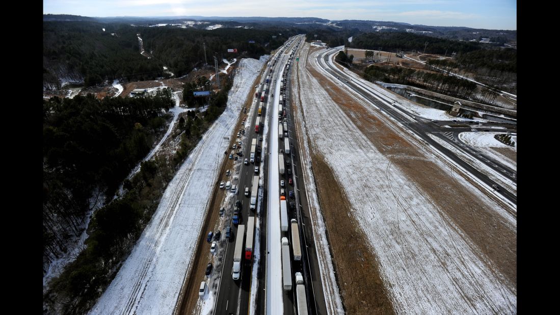 Vehicles remain stranded along Interstate 20 in Leeds, Alabama, on Wednesday, January 29.