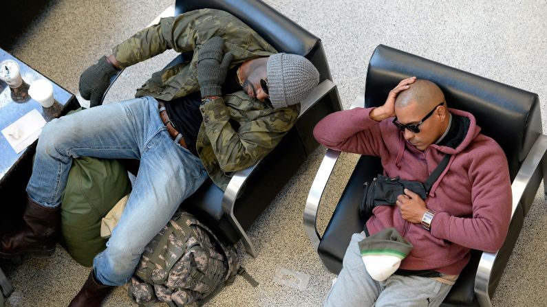 Travelers wait out flight delays at Hartsfield-Jackson Atlanta International Airport on January 30.