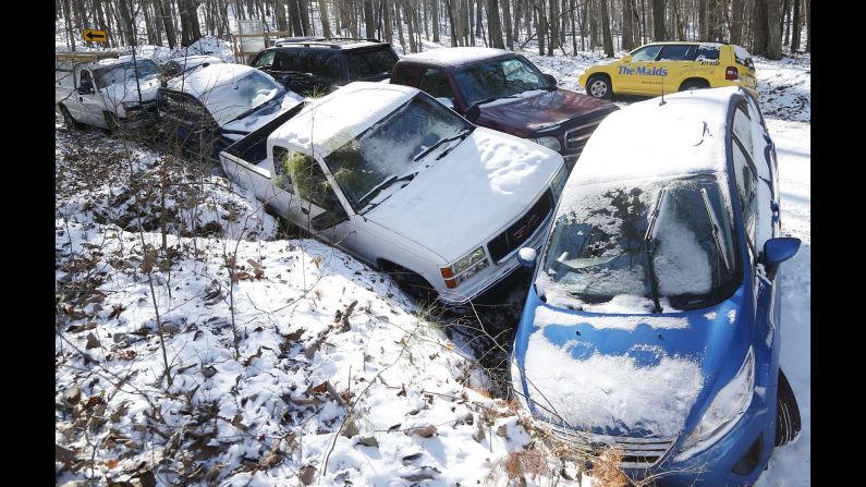 Cars are left abandoned at the bottom of a hill in Birmingham, Alabama, on January 30.