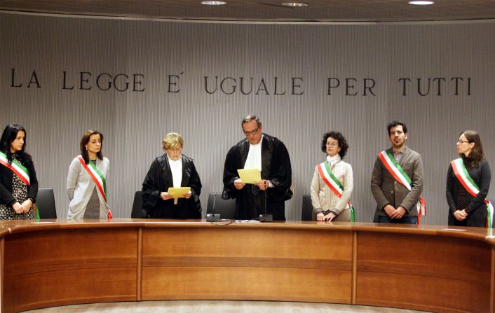 Appeals Court Judge Alessandro Nencini, center, reads the verdict in the death of British student Meredith Kercher in Florence, Italy, on Thursday, January 30, 2014. The appeals court upheld the convictions of  Knox and her ex-boyfriend Raffaele Sollecito for the 2007 murder of her British roommate. Knox was sentenced to 28? years in prison, raising the specter of a long legal battle over her extradition. Sollecito's sentence was 25 years.