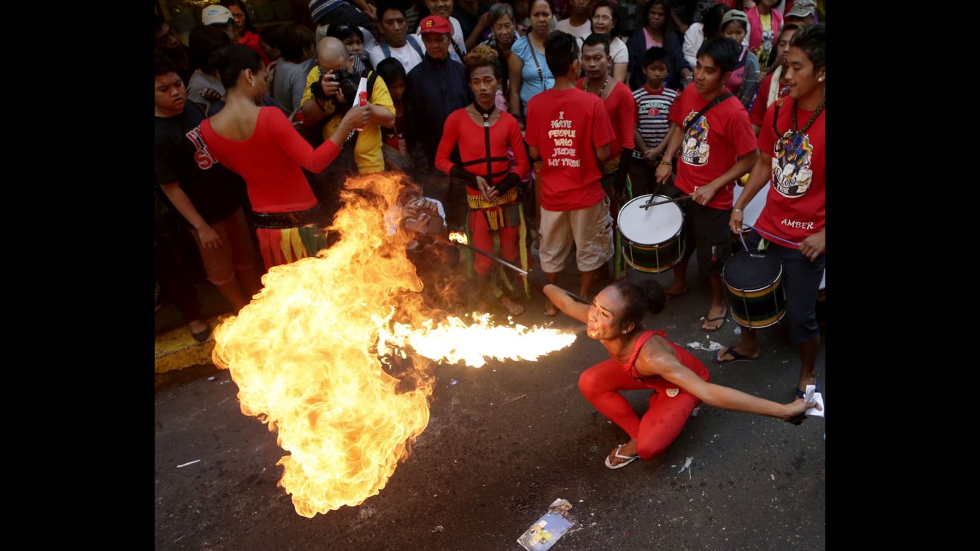 A fire eater performs in the Chinatown district of Manila, Philippines, on January 31.
