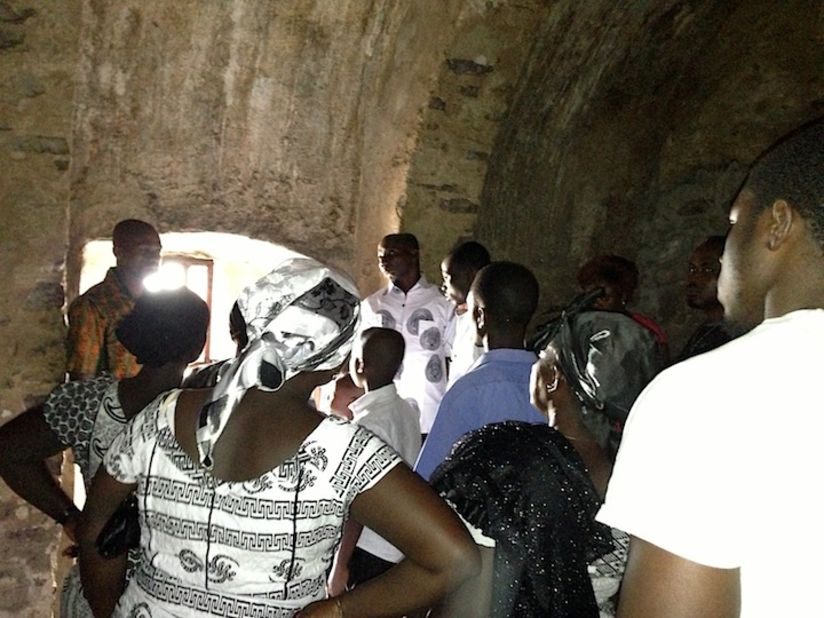 Clark (foreground right, in white shirt) listens to the tour guide explain the life of the slaves imprisoned at Cape Coast Castle. The Swedes built the first fort on the site. It was later held by the Dutch, and then the British, who carried out the slave trade from there. The present castle is the result of extensive British renovations in the late 1700s.