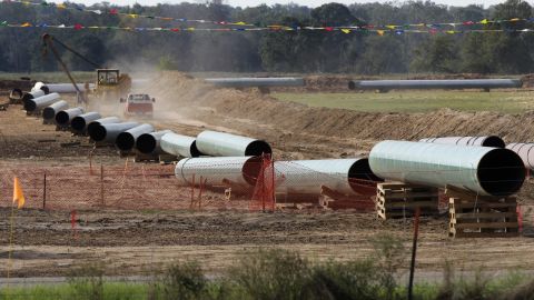 Keystone pipeline sections lie next to a family farm in Sumner, Texas.