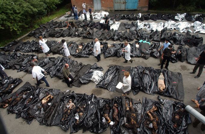 People look for relatives among the dead bodies of the Beslan victims in Vladikavkz, North Ossetia.