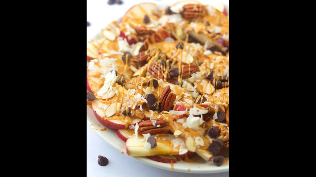 Replace corn chips with apples for apple nachos? Sure! This dessert-like dish mixes apples, nuts and coconut along with peanut butter and chocolate.