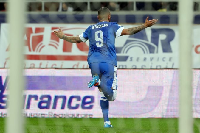 Konstantinos Mitroglou celebrates scoring for Greece in their World Cup playoff match against Romania in November. He has signed for English Premier League Fulham from Olympiakos on the final day of trading.    