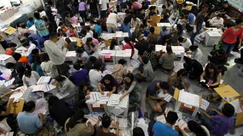 Thai electoral officials prepare material for the general elections at a district office in Bangkok on February 1.