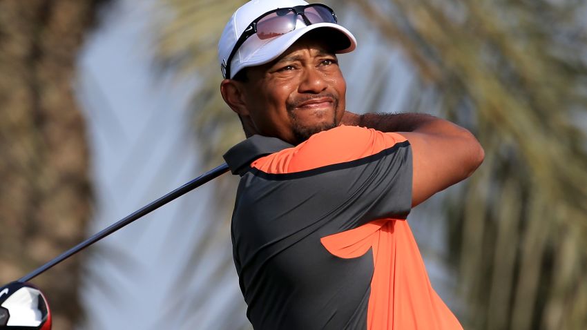  Tiger Woods of the USA plays his tee shot on the par 5, third hole during the third round of the 2014 Omega Dubai Desert Classic on the Majlis Course at the Emirates Golf Club on February 1, 2014 in Dubai, United Arab Emirates. (Photo by David Cannon/Getty Images
