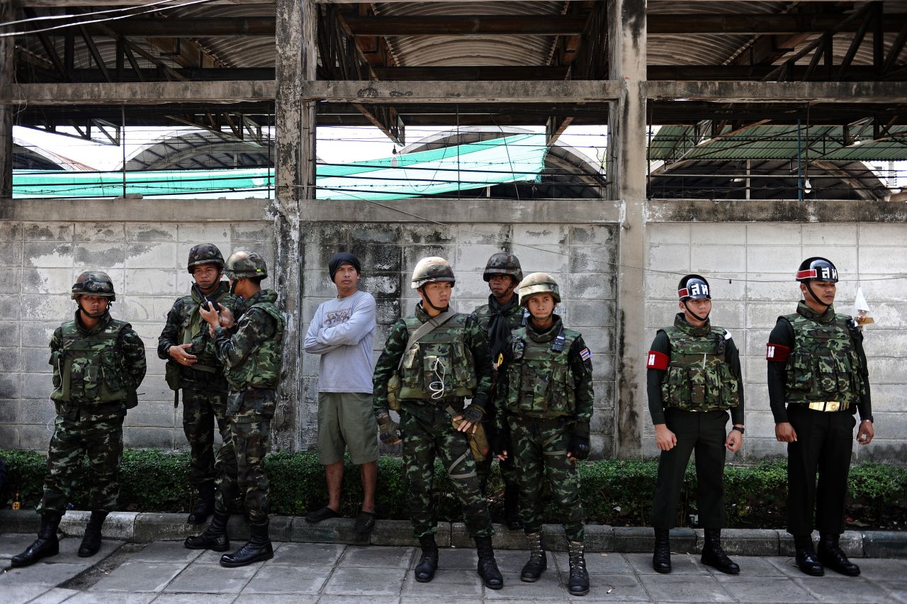 Thai soldiers stand outside a closed polling station on February 2.