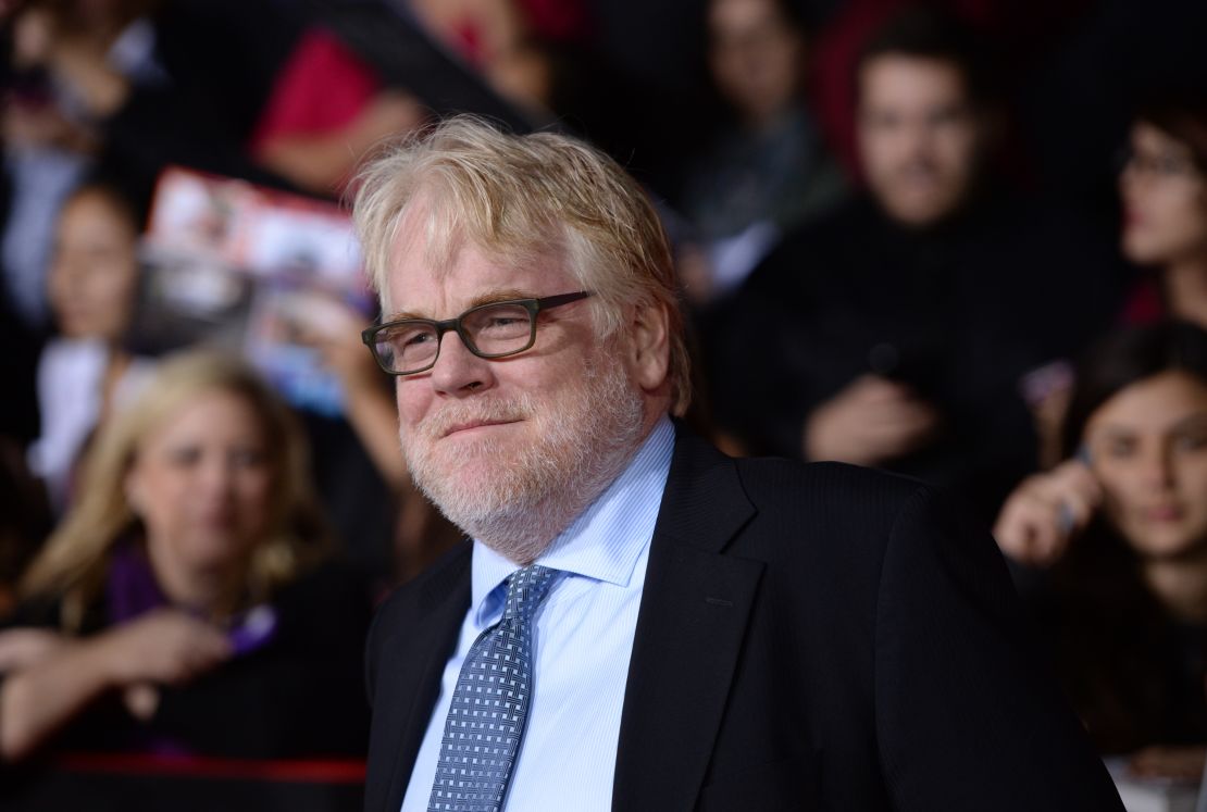  Philip Seymour Hoffman arrives for the Los Angeles premiere of 'The Hunger Games: Catching Fire' at the Nokia Theatre LA Live in Los Angeles, California, on November 18.