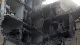 A damaged building is seen in the northern Syrian city of Aleppo on February 2, 2014 following reported air strikes by government forces.