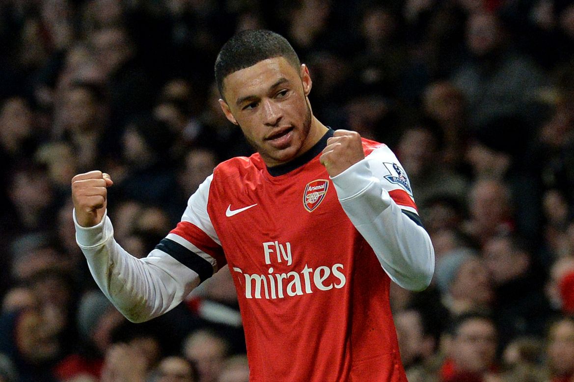 Alex Oxlade-Chamberlain scored a second half double as Arsenal went back to the top of the English Premier League in beating Crystal Palace 2-0.