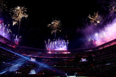 Fireworks go off over the stadium at the end of the halftime show. 