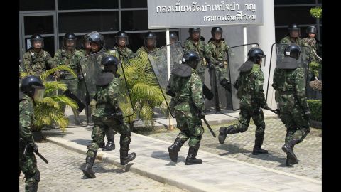 Thai soldiers move in as anti-government protesters stage a rally in Bangkok on February 3.