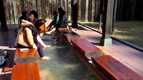 Away from the "Blood Pond," visitors can warm up their toes in less extreme hot spring waters.  