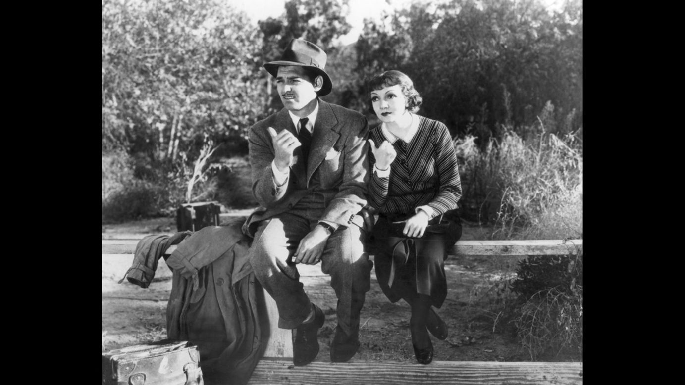 Clark Gable and Claudette Colbert star in "It Happened One Night," which in 1935 wins all five major Academy Awards: best picture, best director, best actor, best actress and best screenplay.
