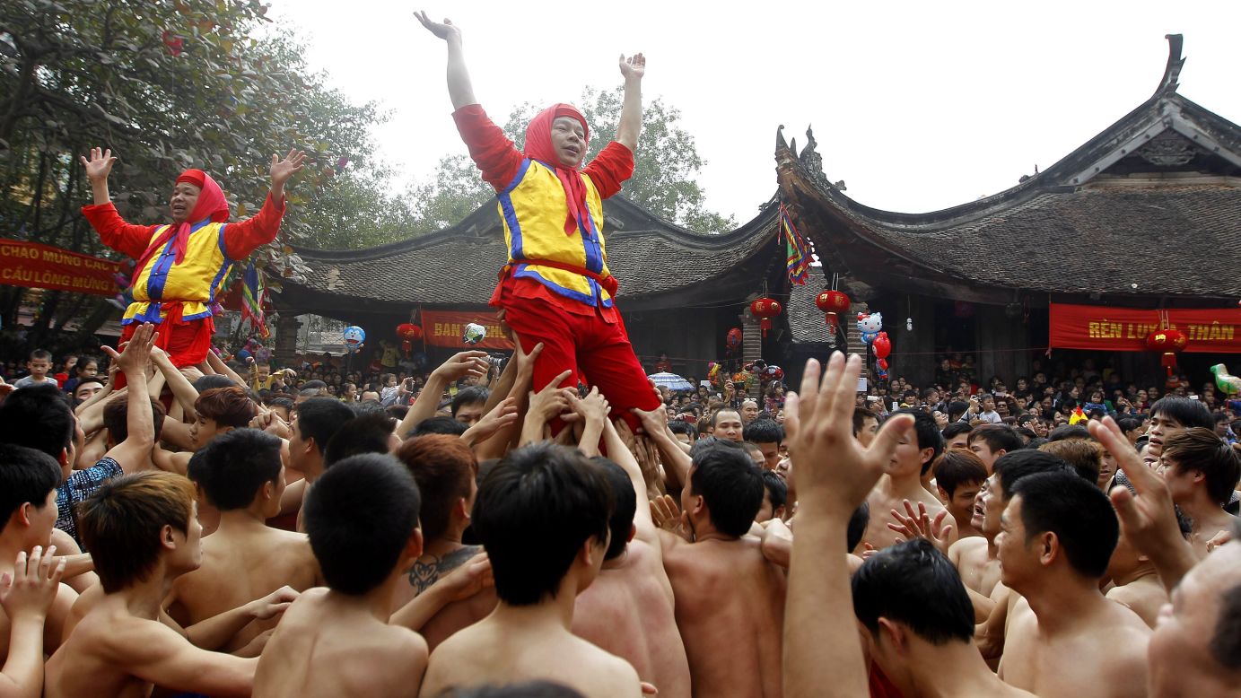 People from Dong Ky, Vietnam, perform a ritual during the village's traditional firecracker festival on February 3. 