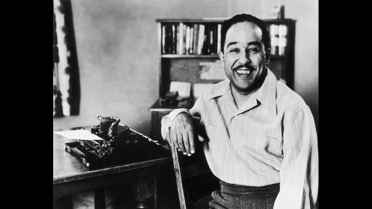 Langston Hughes, known for the poem "A Dream Deferred," sits with his typewriter circa 1945.