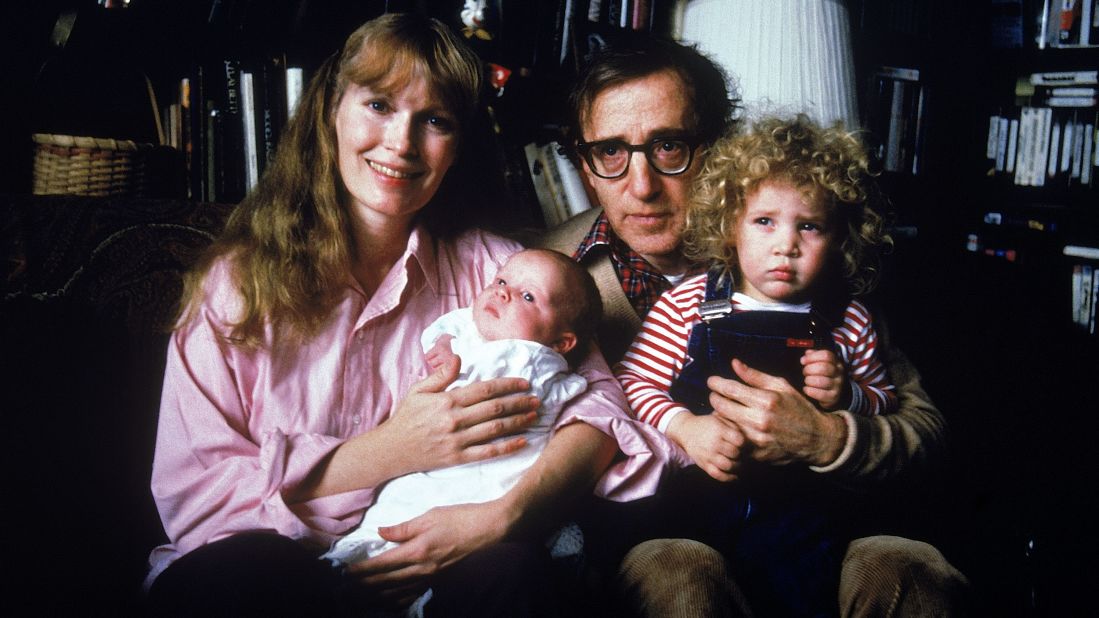 Actress Mia Farrow had a long-term relationship with actor/director Woody Allen, whom she met in 1979. She starred in 13 of his films and he was believed to be the father of her son Satchel (shown here as an infant) as well as the acting father of her other children, including adopted daughter Dylan shown here being held by Allen. The couple split in 1992.