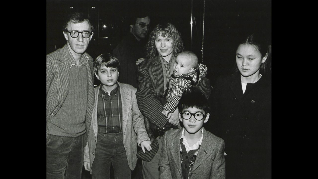 Woody Allen and his then-partner Mia Farrow pose with their blended family, from left, Misha, Dylan (in Farrow's arms), Fletcher and Soon Yi, in New York in 1986. Allen is back in the news after renewed <a href="http://www.cnn.com/2014/02/07/showbiz/woody-allen-dylan-farrow-letter/">allegations that he molested Dylan, which he denies.</a> More people remembered the revelation of his affair with Soon Yi in 1992 than they did the molestation accusations.