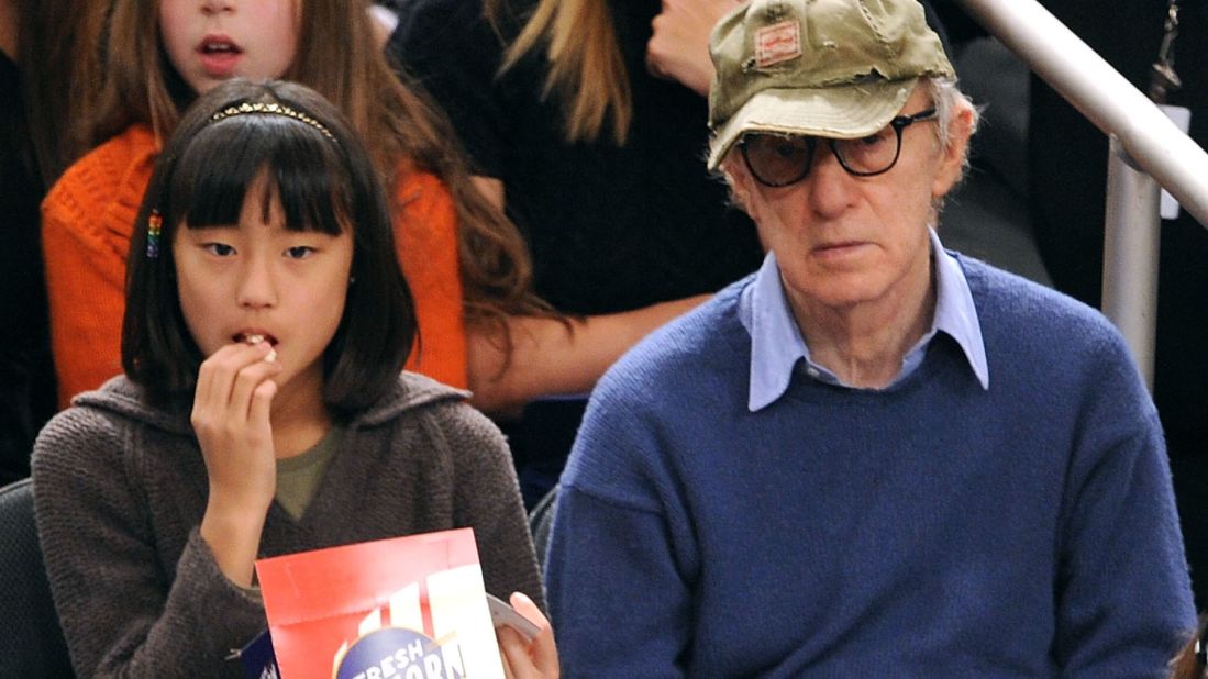 Woody Allen and adopted daughter Bechet Dumaine Allen attend a basketball game in 2009 at Madison Square Garden in New York. Her mother is Allen's current wife, Soon-Yi Previn.