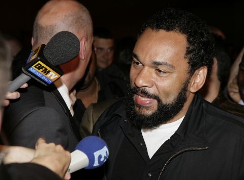Controversial French comedian <a href="http://cnn.com/2014/02/03/world/europe/uk-french-comic-banned/index.html" target="_blank">Dieudonné M'bala M'bala</a> was banned from British soil in February 2014 after making an anti-Semitic gesture.  He said the gesture was anti-establishment.