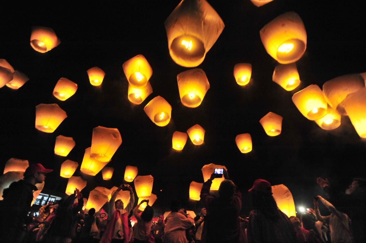 People release sky lanterns to celebrating the Lunar New Year in New Taipei City, Taiwan, on February 3.