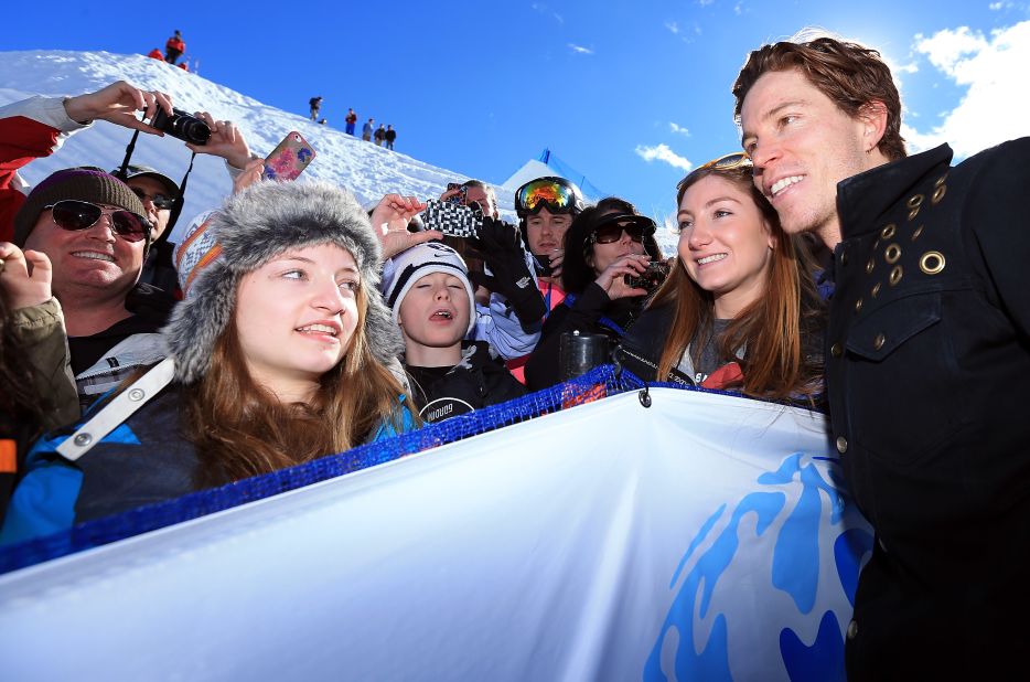 The Winter Olympics are cool for kids. Here the world's most famous snowboarder Shaun White poses for a photo at the Sprint U.S. Grand Prix at Park City Mountain, Utah.