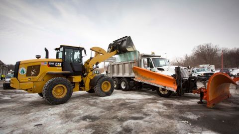 Road salt gets loaded onto a snowplow truck in Glen Ellyn, Illinois, on February 4.