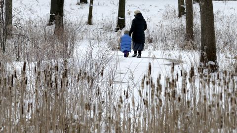 A woman and child take a walk at the North Chagrin Reservation in Willoughby Hills, Ohio, on February 4.